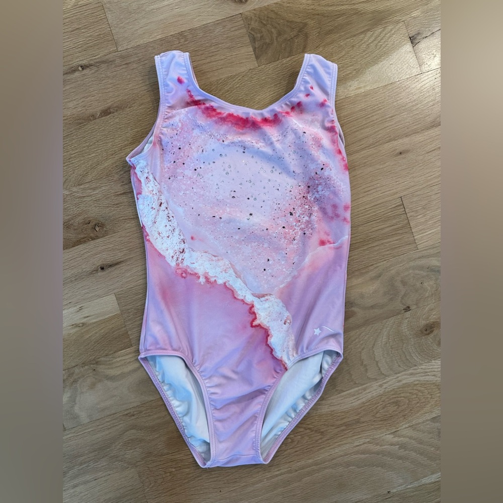 Destira adult small leotard - fit my child at age 11.  Barely worn